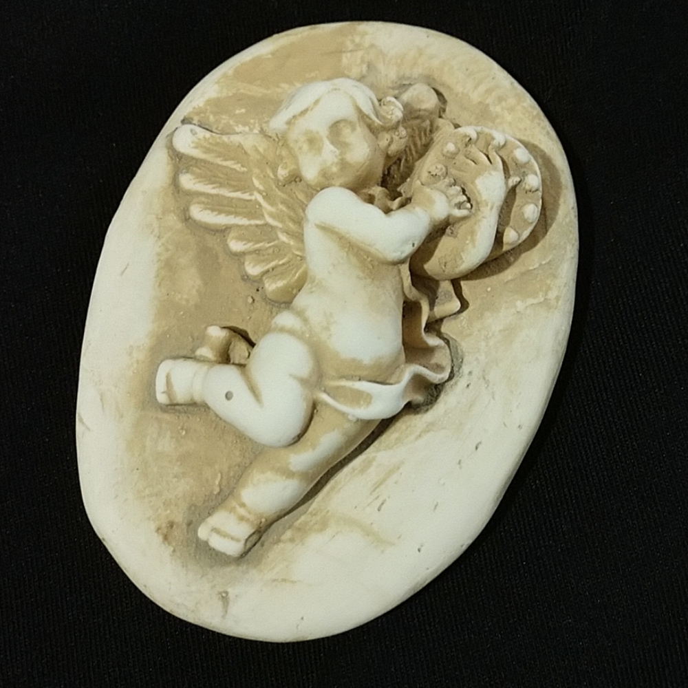5/$25 Tambourine playing angel wall art.